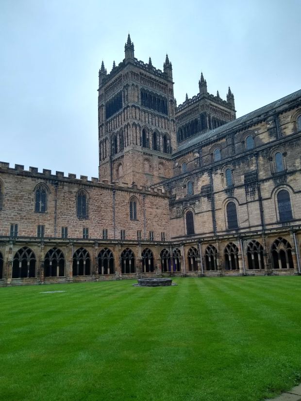 An image of Durham Cathedral surrounded by trees in Durham City Centre, UK.